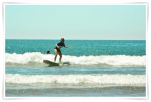 andrea surfing